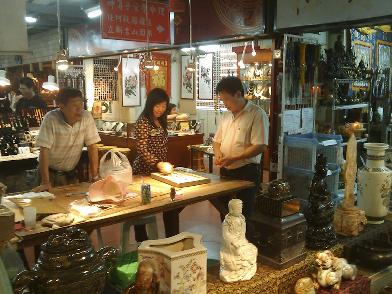These two sellers were engaged in several games of Chinese chess.